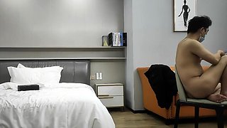 Cute amateur asian web cam girl playing with her toy