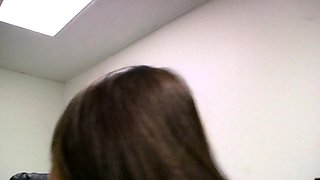 Long haired brunette in a POV blowjob scene
