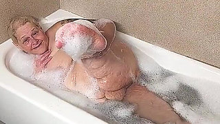 Naughty Bubbler Getting Soapy Masterbating in the Tub Her Pussy She Rubs