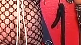 Mature Leather Domme Binds Her Fishnet Slave