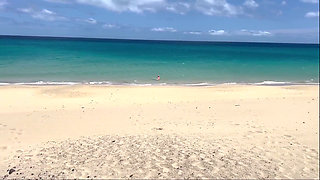 Naked Beach MILF Helps a Jerking Stranger - Cum on Her Ass