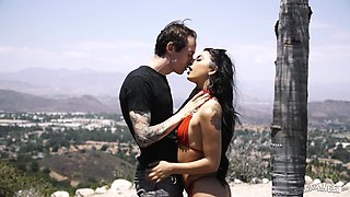 Tattooed stud kisses her cutie Gina Valentina as he fucks her missionary