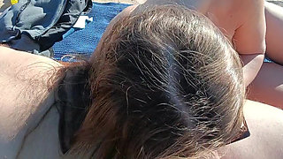 stepdaughter blows stepfather on a nudist beach