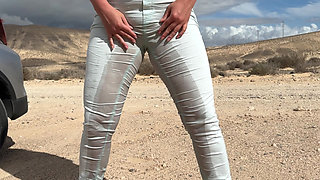 Girl can't hold pee and wet her pants on the public road