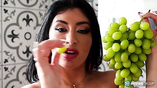 Big-boobed brunette Selena Adams eats a nice banana in a hot way