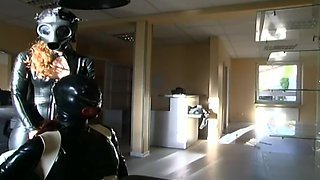 Lesbian fetish girls latex dressed in a hair salon