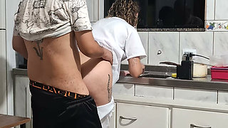 Banging the maid from behind in the kitchen.